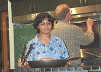  13-Sumana uses tongs.jpg 